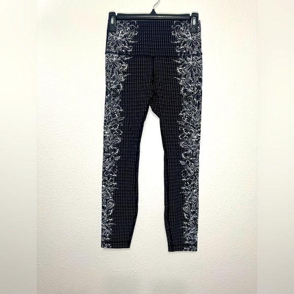 lululemon athletica Pants - Lululemon black and white Floral print down side legs size 6